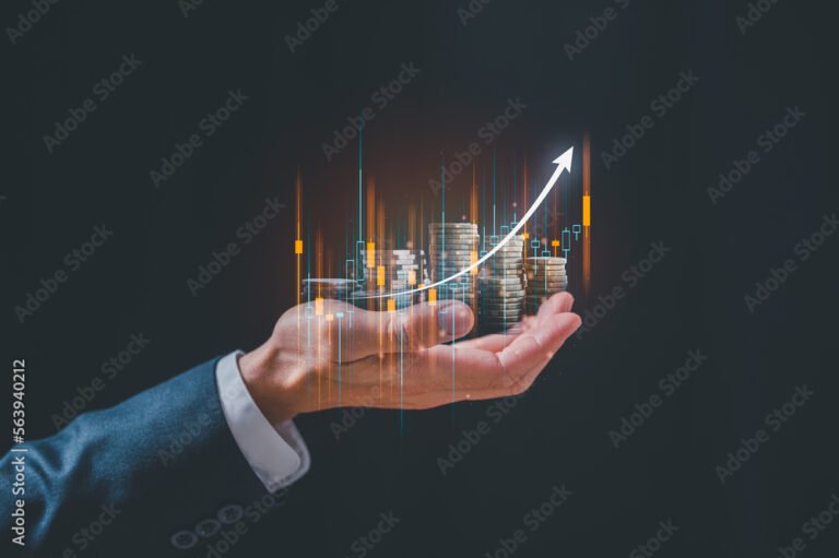 investment and finance concept, businessman holding virtual trading graph and blurred coins on hand, stock market, profits and business growth.