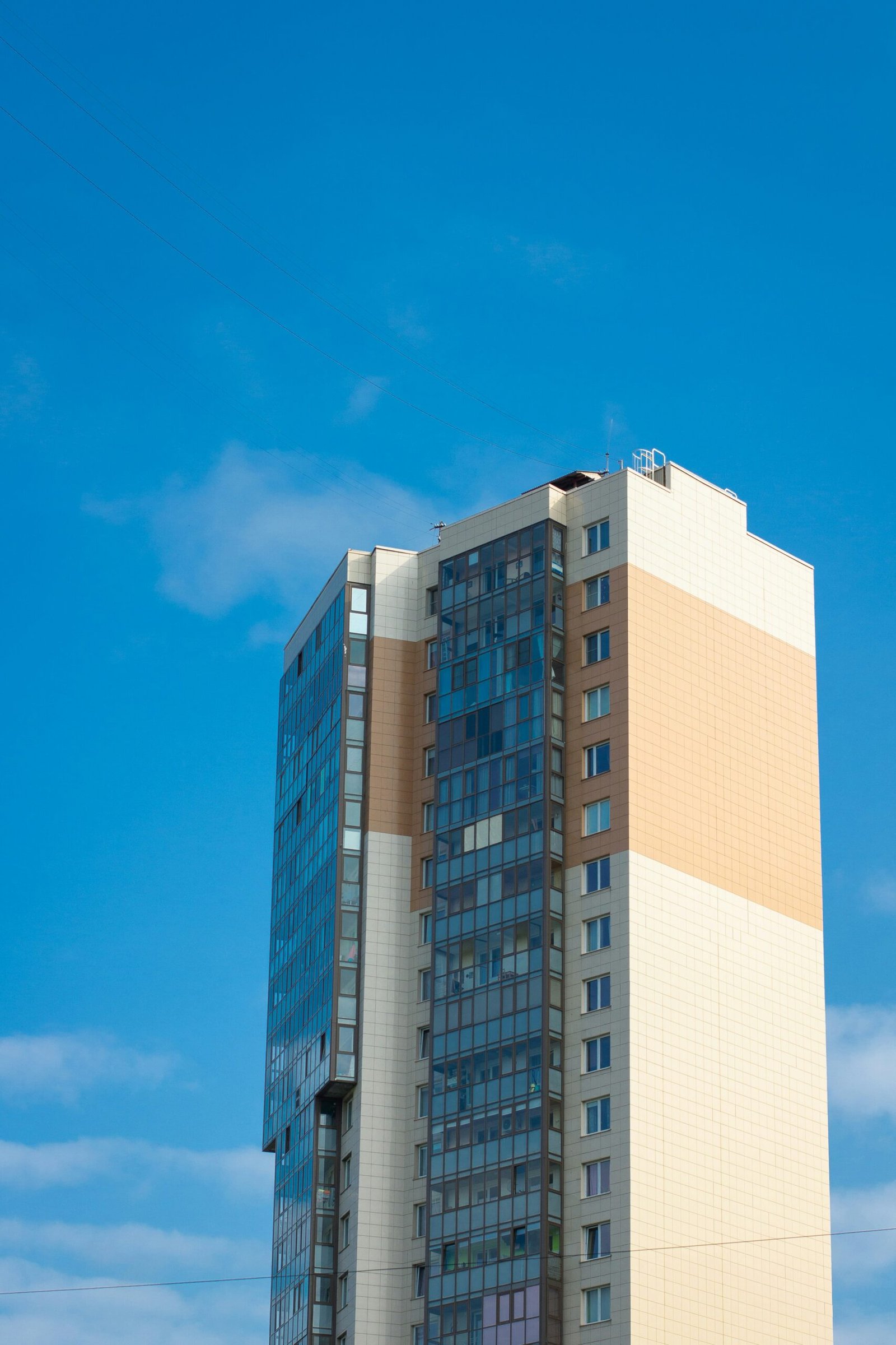 white and blue concrete building under blue sky during daytime